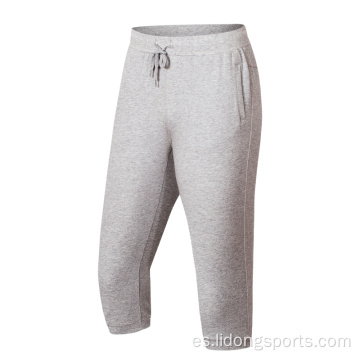 Men Jogger Sport Pantalones de pantalones a medias recortadas